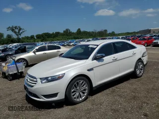 2014 Ford Taurus Limited with VIN 1FAHP2F84EG121559, listed as a Copart auction lot 61764825 with 82,548 mi miles and Salvage title. Bid and sale history available at DreamBid. Image 1.