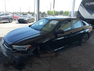 2024 Volkswagen Jetta Sport с VIN 3VWAM7BU2RM008822, выставлен на аукционе IAAI как лот 42258345 с пробегом 41 165 миль миль и . История ставок и продаж доступна на DreamBid. Изображение 2.