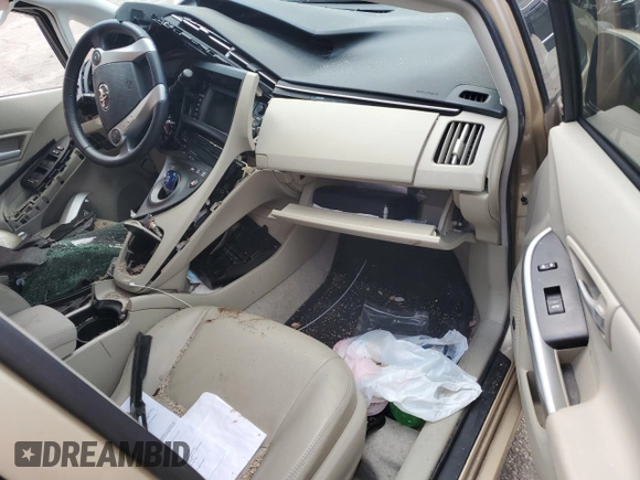 2011 Toyota Prius I z VIN JTDKN3DUXB0322138, wystawiony jako Copart lot #58489395 z przebiegiem Nie podano mil oraz Szkoda całkowita • Salvage title. Historia ofert i sprzedaży dostępna na DreamBid. Obrazek 8.