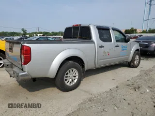 2014 Nissan Frontier SV with VIN 1N6AD0FV1EN734214, listed as a Copart auction lot 59261715 with 114,413 mi miles and Salvage title. Bid and sale history available at DreamBid. Image 3.