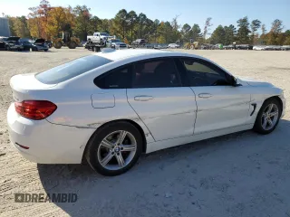2015 BMW 4 Series 428i xDrive with VIN WBA4C9C53FG135040, listed as a Copart auction lot 74473923 with 102,271 mi miles and . Bid and sale history available at DreamBid. Image 3.
