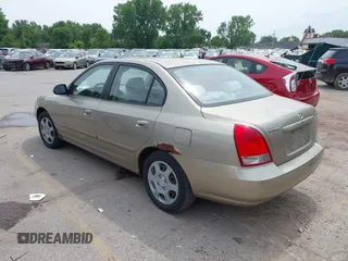 2003 Hyundai Elantra GLS z VIN KMHDN45D73U556305, wystawiony jako IAAI lot #42478211 z przebiegiem 149 648 mil mil oraz . Historia ofert i sprzedaży dostępna na DreamBid. Obrazek 3.