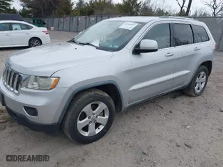 2011 Jeep Grand Cherokee Laredo with VIN 1J4RR4GG9BC718861, listed as a IAAI auction lot 41920517 with 144,245 mi miles. Bid and sale history available at carsss.com. Image 2.