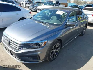 2020 Volkswagen Passat 2.0T SEL with VIN 1VWCA7A30LC025234, listed as a IAAI auction lot 41699506 with 49,117 mi miles. Bid and sale history available at carsss.com. Image 2.