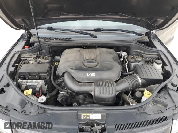 2014 Jeep Grand Cherokee Overland with VIN 1C4RJFCG9EC572237, listed as a Copart auction lot 53864865 with 90,657 mi miles and Salvage Title. Bid and sale history available at DreamBid. Image 12.