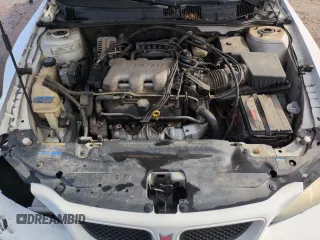 2004 Pontiac Grand Am SE1 with VIN 1G2NF52E24C209811, listed as a Copart auction lot 53577115 with 199,494 mi miles and Salvage Title. Bid and sale history available at carsss.com. Image 11.