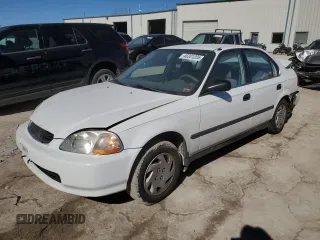 1997 Honda Civic LX with VIN 1HGEJ6675VL013442, listed as a Copart auction lot 46301205 with 203,777 mi miles and Salvage Title. Bid and sale history available at carsss.com. Image 1.