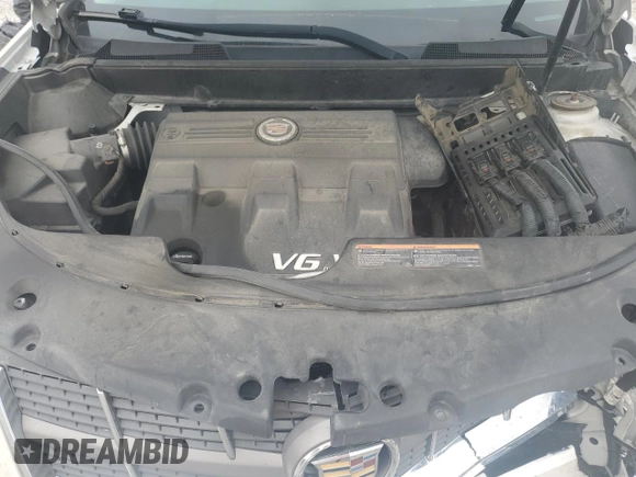 2012 Cadillac SRX Performance Collection z VIN 3GYFNBE32CS615988, wystawiony jako Copart lot #61198415 z przebiegiem 156 135 mil mil oraz Szkoda całkowita • Salvage title. Historia ofert i sprzedaży dostępna na DreamBid. Obrazek 12.