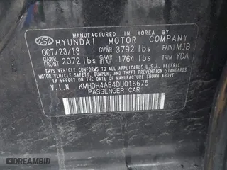 2013 Hyundai Elantra GLS PZEV with VIN KMHDH4AE4DU016675, listed as a IAAI auction lot 42009797 with 104,343 mi miles. Bid and sale history available at carsss.com. Image 9.
