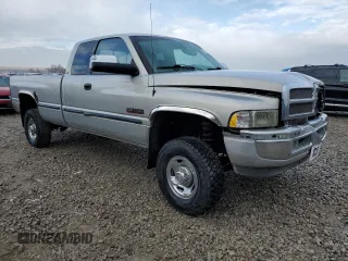 1999 Dodge Ram 2500 with VIN 1B7KF2360XJ650261, listed as a Copart auction lot 85682364 with 203,719 mi miles and Salvage Title. Bid and sale history available at carsss.com. Image 4.