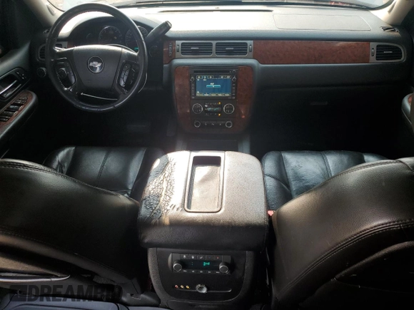 2007 Chevrolet Tahoe LTZ с VIN 1GNFK130X7J354528, выставлен на аукционе Copart как лот 59683165 с пробегом 252 884 миль миль и Списание • Salvage title. История ставок и продаж доступна на DreamBid. Изображение 8.
