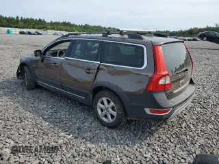 2013 Volvo XC70 3.2L with VIN YV4940BZ6D1168035, listed as a Copart auction lot 71099204 with 132,360 mi miles and Salvage Title. Bid and sale history available at DreamBid. Image 2.