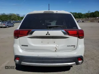 2016 Mitsubishi Outlander SE with VIN JA4AZ3A30GZ037053, listed as a Copart auction lot 57174405 with 105,621 mi miles and Salvage title. Bid and sale history available at DreamBid. Image 6.