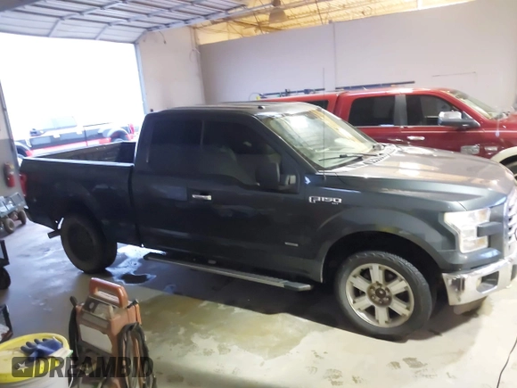 2015 Ford F-150 XLT with VIN 1FTEX1EP3FKE57475, listed as a IAAI auction lot 41435394 with 233,560 mi miles. Bid and sale history available at carsss.com. Image 13.