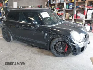 2008 MINI Hardtop S with VIN WMWMF73568TT87273, listed as a IAAI auction lot 41996859 with 107,671 mi miles and . Bid and sale history available at DreamBid. Image 1.