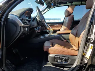 2016 BMW X5 xDrive50i with VIN 5UXKR6C59G0J81052, listed as a Copart auction lot 49572985 with 90,207 mi miles and Salvage Title. Bid and sale history available at carsss.com. Image 7.