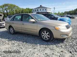 2001 Toyota Avalon XL z VIN 4T1BF28B01U175170, wystawiony jako Copart lot #58497125 z przebiegiem 99 699 mil mil oraz Tytuł czysty. Historia ofert i sprzedaży dostępna na DreamBid. Obrazek 4.