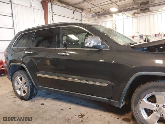 2011 Jeep Grand Cherokee Limited with VIN 1J4RR5GG3BC651065, listed as a IAAI auction lot 41020593 with 154,825 mi miles. Bid and sale history available at carsss.com. Image 13.