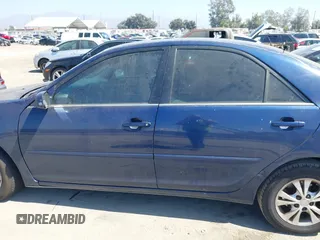 2005 Toyota Camry LE with VIN 4T1BF32K25U101690, listed as a IAAI auction lot 40453083 with 246,087 mi miles and . Bid and sale history available at DreamBid. Image 13.