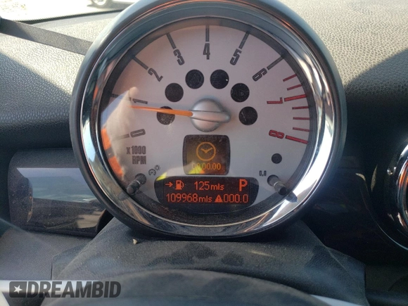 2009 MINI Hardtop S with VIN WMWMF73569TW80561, listed as a Copart auction lot 52615805 with 109,968 mi miles and Salvage title. Bid and sale history available at DreamBid. Image 9.