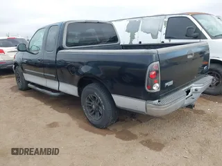2002 Ford F-150 XL with VIN 1FTRX17W92NC06992, listed as a IAAI auction lot 41194470 with 253,923 mi miles. Bid and sale history available at carsss.com. Image 3.