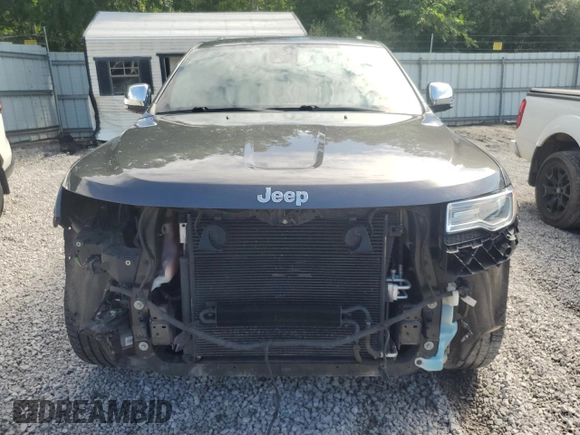 2014 Jeep Grand Cherokee Summit with VIN 1C4RJFJT4EC346946, listed as a Copart auction lot 60613025 with 50,565 mi miles and Salvage title. Bid and sale history available at DreamBid. Image 5.