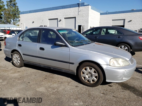 1999 Honda Civic LX with VIN 2HGEJ6571XH552867, listed as a Copart auction lot 81715654 with 234,544 mi miles and Salvage Title. Bid and sale history available at DreamBid. Image 4.