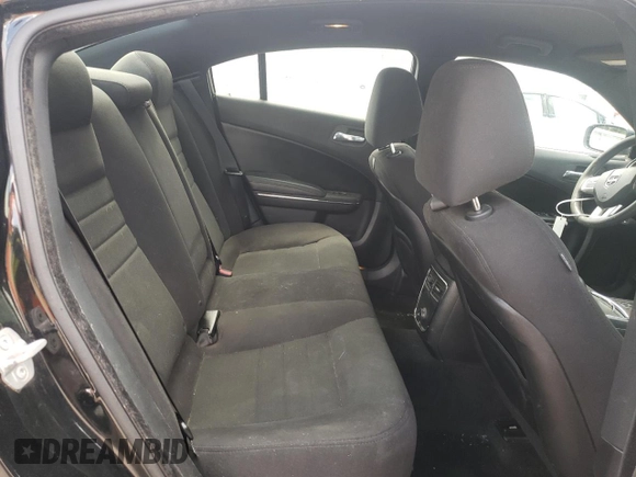 2013 Dodge Charger SE z VIN 2C3CDXBG3DH625499, wystawiony jako Copart lot #56881555 z przebiegiem 182 389 mil mil oraz Szkody całkowita. Historia ofert i sprzedaży dostępna na DreamBid. Obrazek 10.