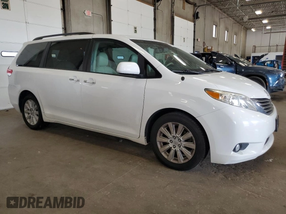 2013 Toyota Sienna XLE with VIN 5TDDK3DC9DS070424, listed as a Copart auction lot 61406715 with 193,583 mi miles and Salvage title. Bid and sale history available at DreamBid. Image 4.