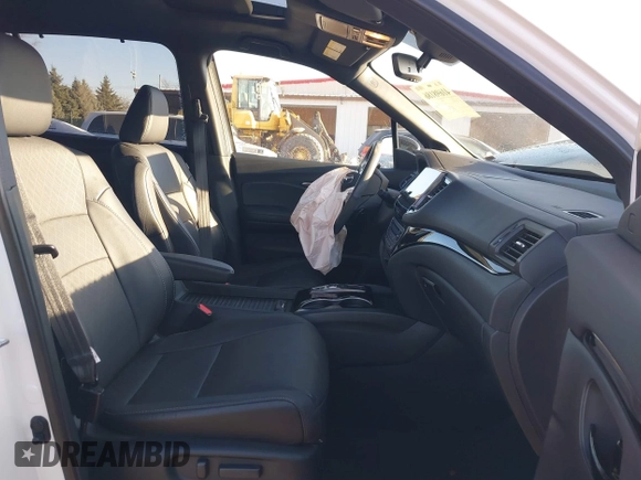 2023 Honda Passport Elite with VIN 5FNYF8H05PB005081, listed as a IAAI auction lot 41698186 with 31,853 mi miles and . Bid and sale history available at DreamBid. Image 5.