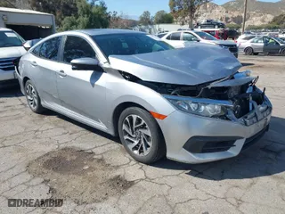 2018 Honda Civic Sedan EX with VIN 2HGFC2F79JH507818, listed as a IAAI auction lot 42001508 with 82,103 mi miles. Bid and sale history available at carsss.com. Image 1.