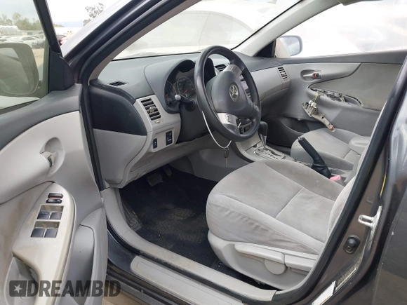 2011 Toyota Corolla L with VIN JTDBU4EE3BJ090749, listed as a IAAI auction lot 42106633 with 209,824 mi miles. Bid and sale history available at carsss.com. Image 5.