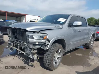 2019 Ram 1500 Laramie with VIN 1C6SRFJT8KN686506, listed as a IAAI auction lot 42499382 with 145,287 mi miles and . Bid and sale history available at DreamBid. Image 2.