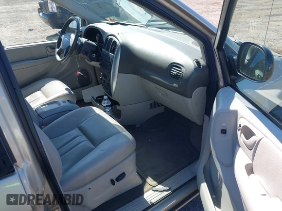 2006 Chrysler Town & Country Touring with VIN 2A8GP54L06R727898, listed as a IAAI auction lot 41893586 with 119,296 mi miles and . Bid and sale history available at DreamBid. Image 5.