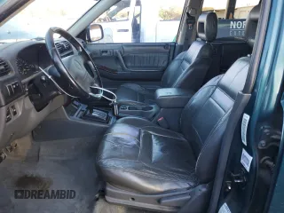 1999 Isuzu Rodeo S с VIN 4S2CK58W6X4352441, выставлен на аукционе Copart как лот 81915384 с пробегом 338 513 миль миль и На запчасти • Non repairable. История ставок и продаж доступна на DreamBid. Изображение 7.