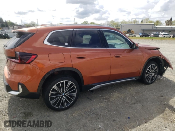 2025 BMW X1 xDrive28i with VIN WBX73EF03S5094250, listed as a Copart auction lot 51174465 with 51 mi miles and Salvage title. Bid and sale history available at DreamBid. Image 3.