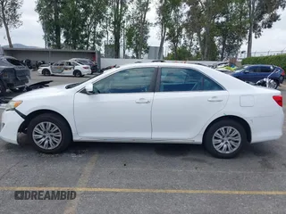 2014 Toyota Camry L with VIN 4T1BF1FK4EU403013, listed as a IAAI auction lot 42115089 with 221,686 mi miles and . Bid and sale history available at DreamBid. Image 14.