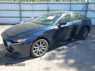 2020 Mazda 3 Select z VIN JM1BPACL2L1165675, wystawiony jako IAAI lot #42232872 z przebiegiem 99 261 mil mil oraz . Historia ofert i sprzedaży dostępna na DreamBid. Obrazek 2.