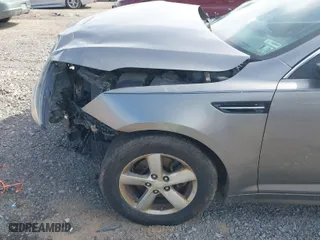 2014 Kia Optima LX with VIN 5XXGM4A79EG287804, listed as a IAAI auction lot 41824981 with 191,213 mi miles. Bid and sale history available at carsss.com. Image 6.