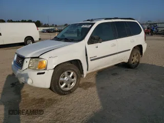 2006 GMC Envoy SLT with VIN 1GKDS13S962230376, listed as a Copart auction lot 43613965 with 136,462 mi miles and Salvage Title. Bid and sale history available at carsss.com. Image 1.