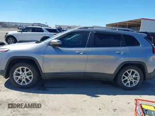 2016 Jeep Cherokee 75th Anniversary with VIN 1C4PJLCB1GW217638, listed as a IAAI auction lot 41689623 with 124,630 mi miles and . Bid and sale history available at DreamBid. Image 14.