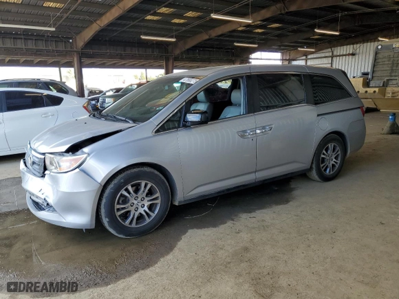 2012 Honda Odyssey EX-L with VIN 5FNRL5H64CB123343, listed as a Copart auction lot 47898275 with 142,280 mi miles and Salvage Title. Bid and sale history available at carsss.com. Image 1.