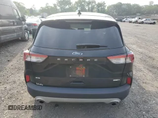 2020 Ford Escape SE z VIN 1FMCU9G68LUA65574, wystawiony jako Copart lot #60723395 z przebiegiem 23 801 mil mil oraz Szkoda całkowita • Salvage title. Historia ofert i sprzedaży dostępna na DreamBid. Obrazek 6.