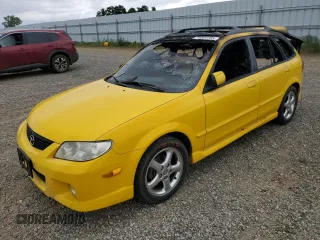 2002 Mazda Protege z VIN JM1BJ245821523836, wystawiony jako Copart lot #54591765 z przebiegiem Nie podano mil oraz Szkoda całkowita • Salvage title. Historia ofert i sprzedaży dostępna na DreamBid. Obrazek 1.
