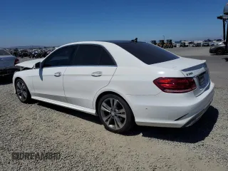 2015 Mercedes-Benz E 350 Sport with VIN WDDHF5KB8FB132102, listed as a Copart auction lot 62926465 with 89,055 mi miles and Salvage title. Bid and sale history available at DreamBid. Image 2.