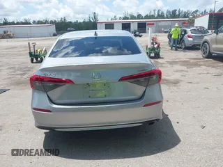 2022 Honda Civic Sport z VIN 2HGFE2F58NH586977, wystawiony jako IAAI lot #42202088 z przebiegiem 56 060 mil mil oraz . Historia ofert i sprzedaży dostępna na DreamBid. Obrazek 16.