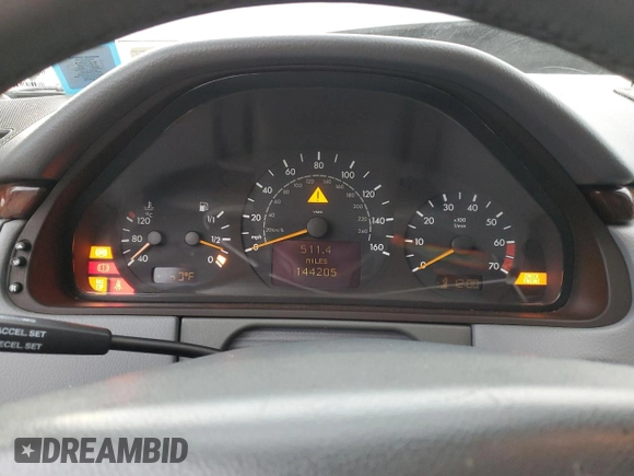 2000 Mercedes-Benz E-Class with VIN WDBJF65J8YB153103, listed as a Copart auction lot 80986234 with 144,205 mi miles and Salvage Title. Bid and sale history available at carsss.com. Image 9.