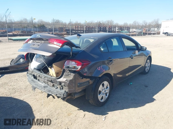 2017 Kia Forte LX with VIN 3KPFK4A76HE143867, listed as a IAAI auction lot 41623307 with 64,097 mi miles. Bid and sale history available at carsss.com. Image 4.