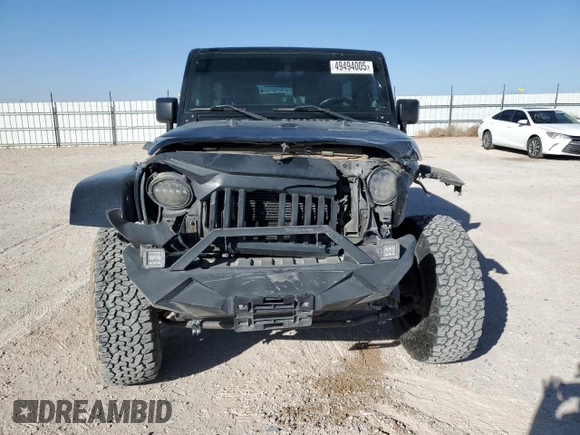 2012 Jeep Wrangler Unlimited Rubicon z VIN 1C4HJWFG9CL105047, wystawiony jako Copart lot #49494005 z przebiegiem 132 591 mil mil oraz Szkoda całkowita • Salvage title. Historia ofert i sprzedaży dostępna na DreamBid. Obrazek 5.