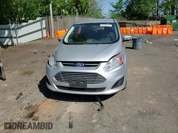 2013 Ford C-Max SE z VIN 1FADP5AU3DL521199, wystawiony jako Copart lot #55250685 z przebiegiem 87 362 mil mil oraz Szkoda całkowita • Salvage title. Historia ofert i sprzedaży dostępna na DreamBid. Obrazek 14.